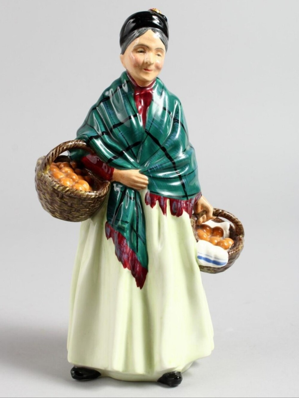 Vintage Royal Doulton Figurine in Pale Green and White - "The Orange Lady" Mark